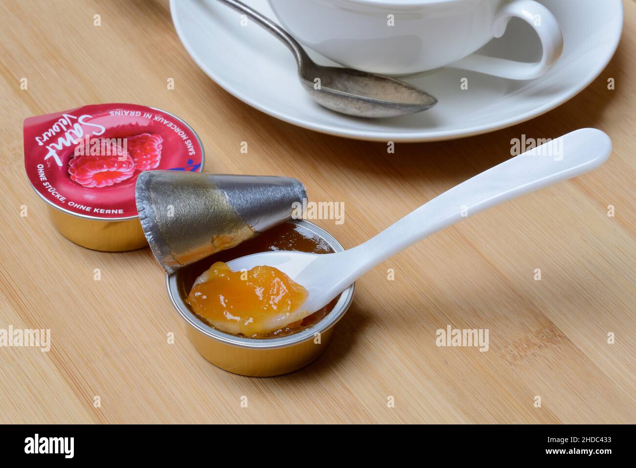 Jam in portion pack with spoon, jam Stock Photo Alamy