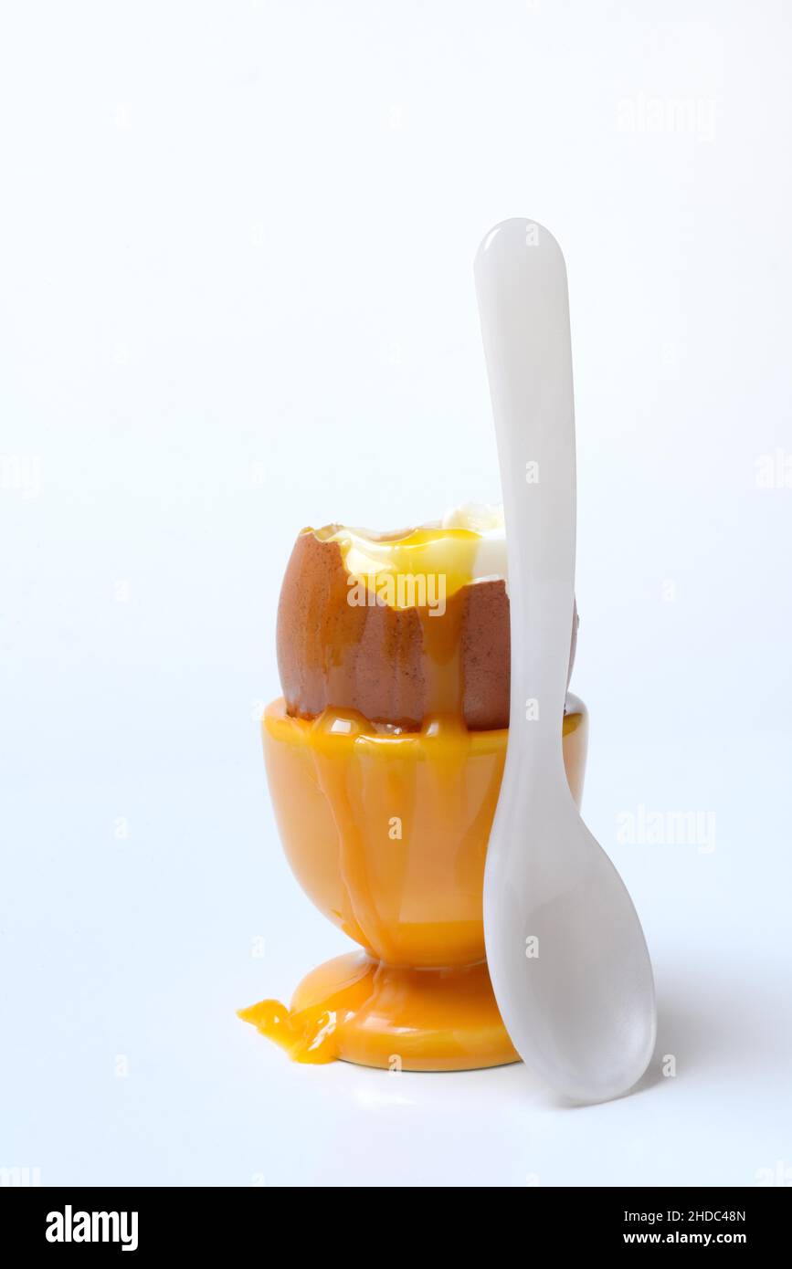 Boiled egg with spoon hi-res stock photography and images - Alamy