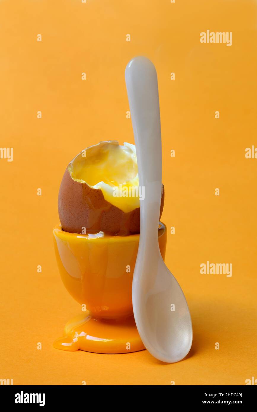 Boiled egg with spoon hi-res stock photography and images - Alamy
