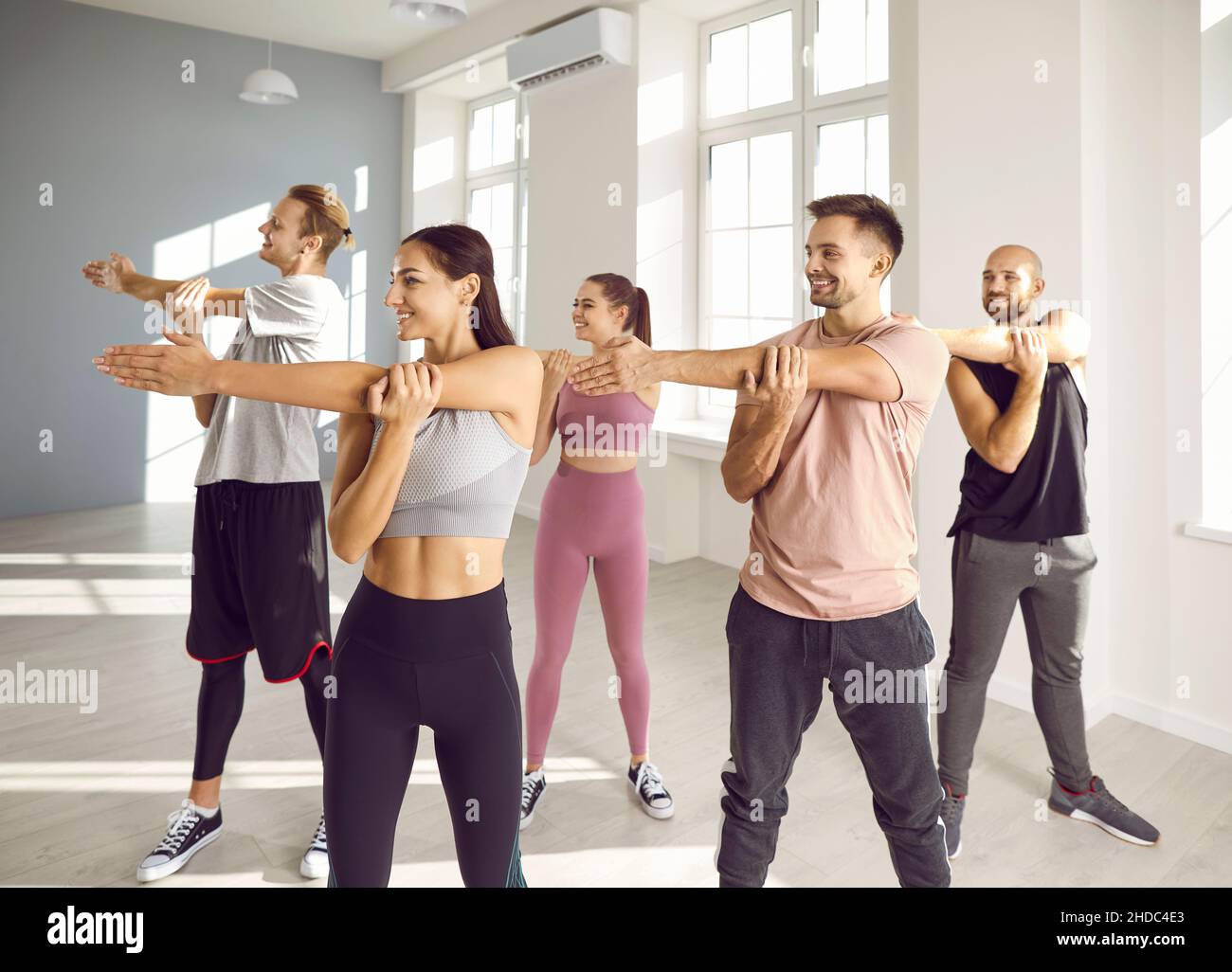 Woman exercising with arms up - Stock Image - F007/9404 - Science