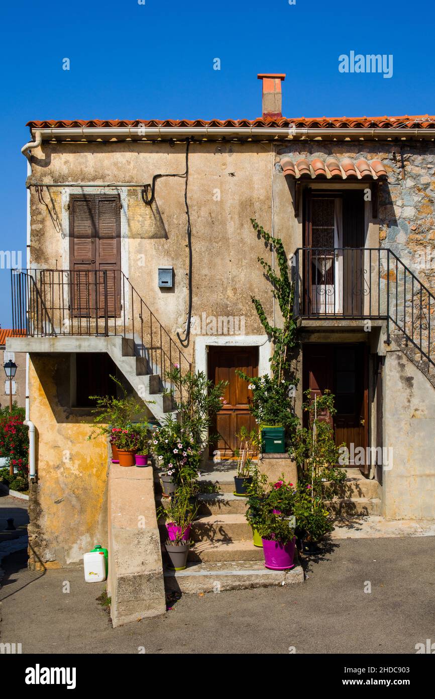 Houses decorated with flowers in Piana in the Calanche, Corsica, Piana, Corsica, France Stock Photo