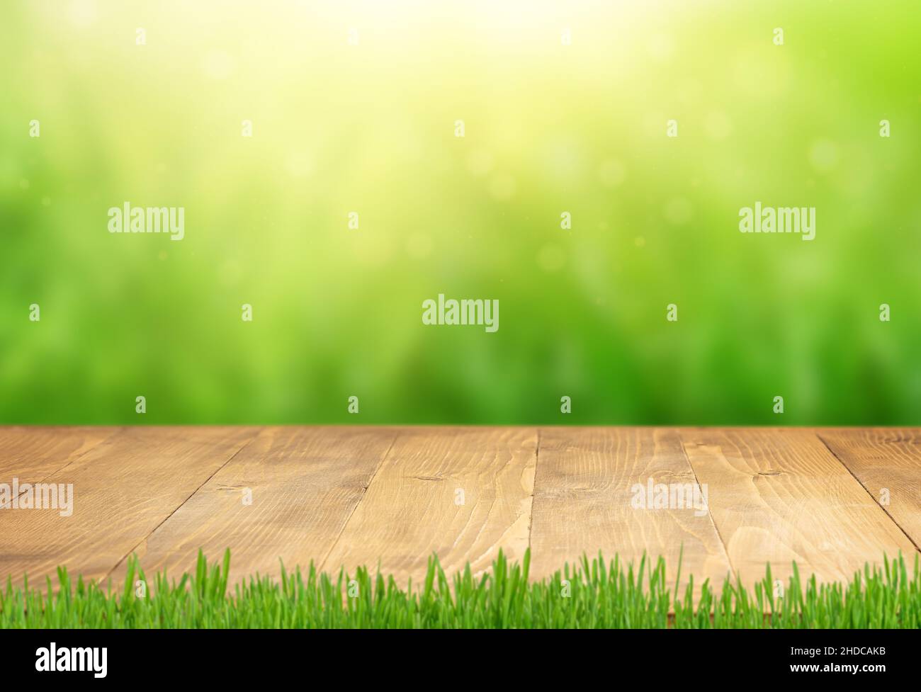 Empty wooden table top on blurred green natural background Stock Photo ...