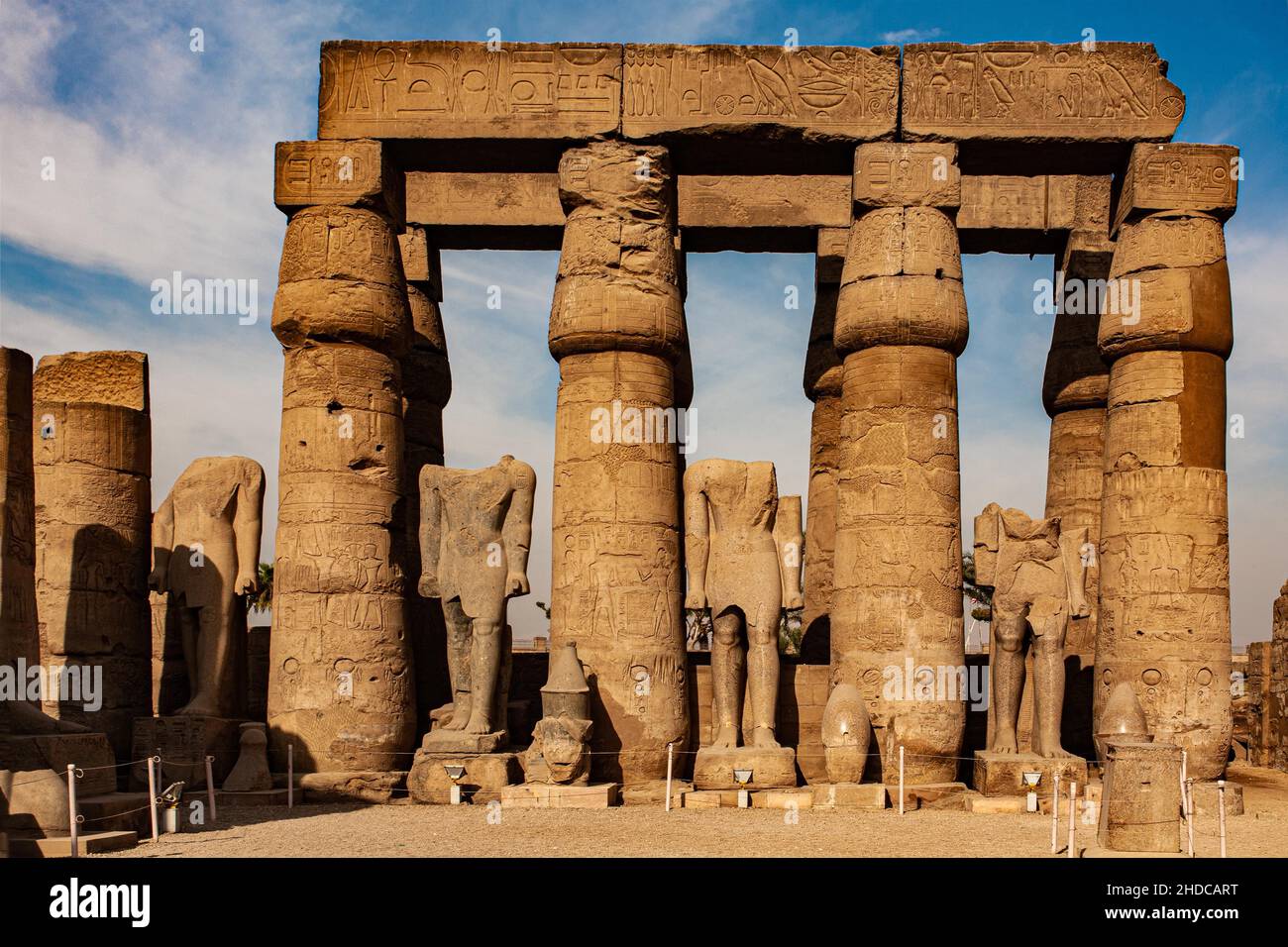 Court of Ramses II all statues show the king striding, left leg placed