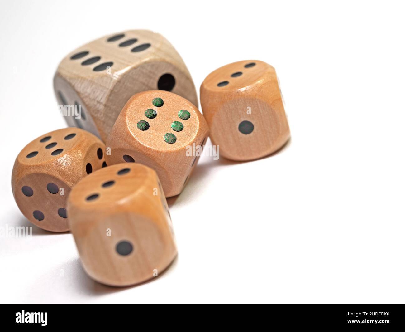Wooden game dice against a white background Stock Photo Alamy