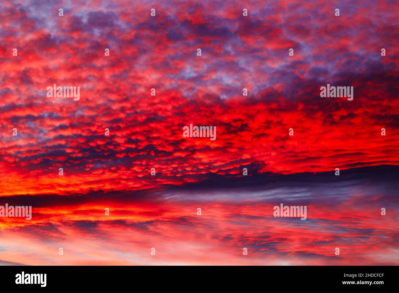 Amazing Dramatic Sunset Sky with Red Clouds Stock Photo - Alamy