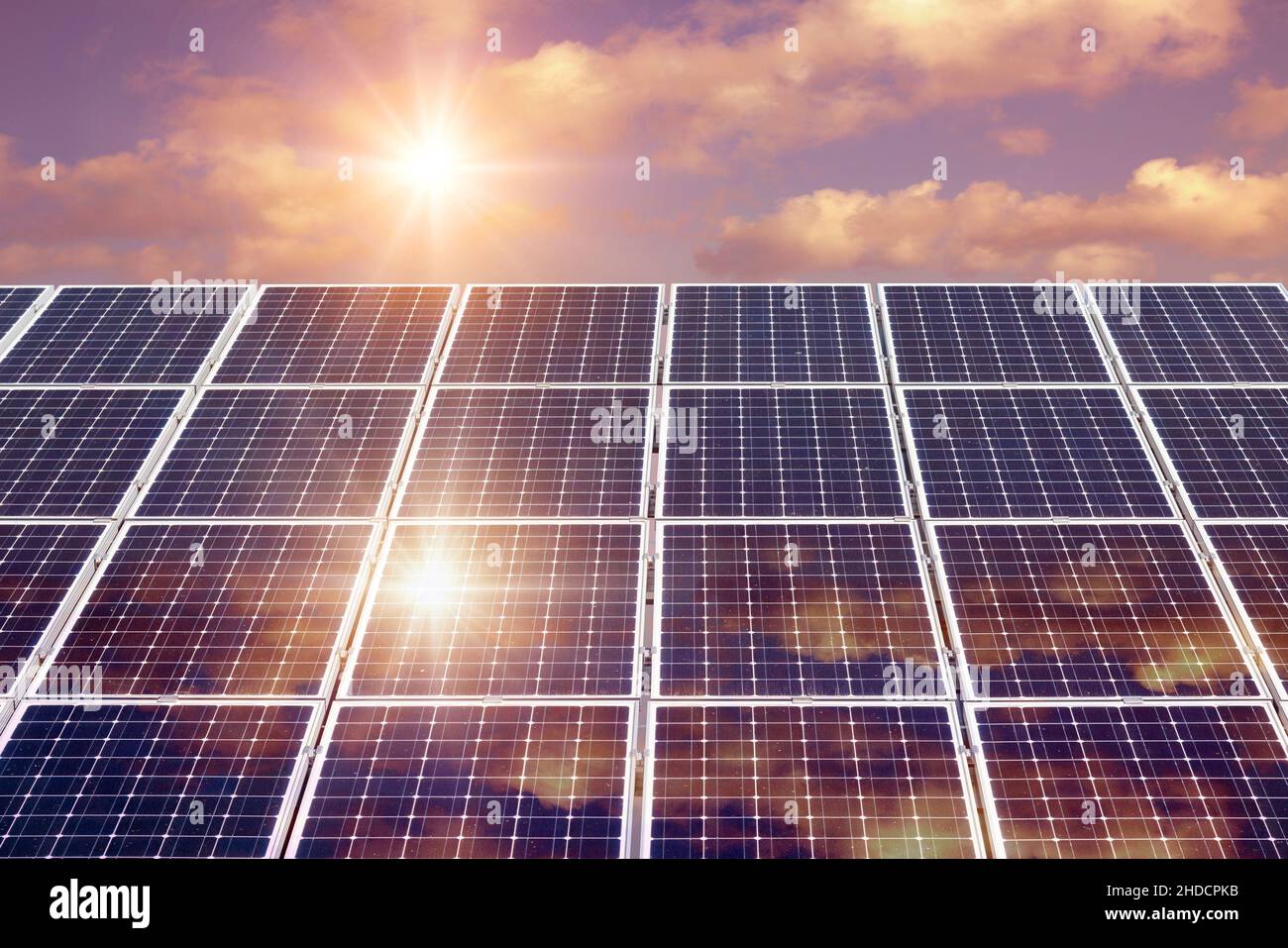 Photo collage of sunset and solar panel, photovoltaic, alternative ...