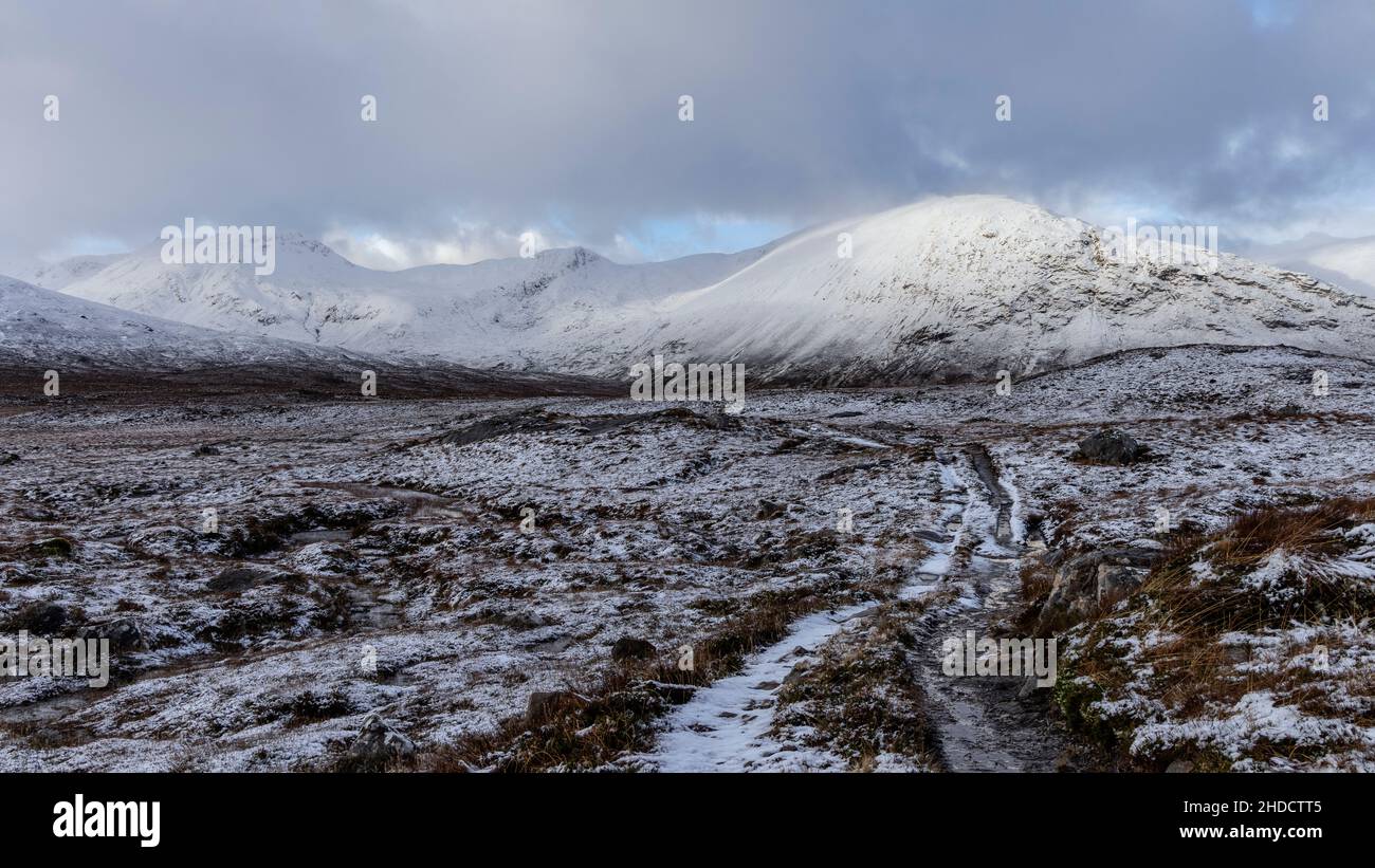 The snow covered summits of Sron Gharbh, An Leth-Chreag and Tom a' Choinich viewed from the south east. Glen Affric, Highland, Scotland Stock Photo