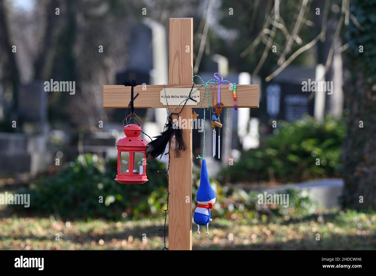 Vienna, Austria. The Central Cemetery in Vienna. Wooden cross with lantern and various additions at the Central Cemetery in Vienna Stock Photo