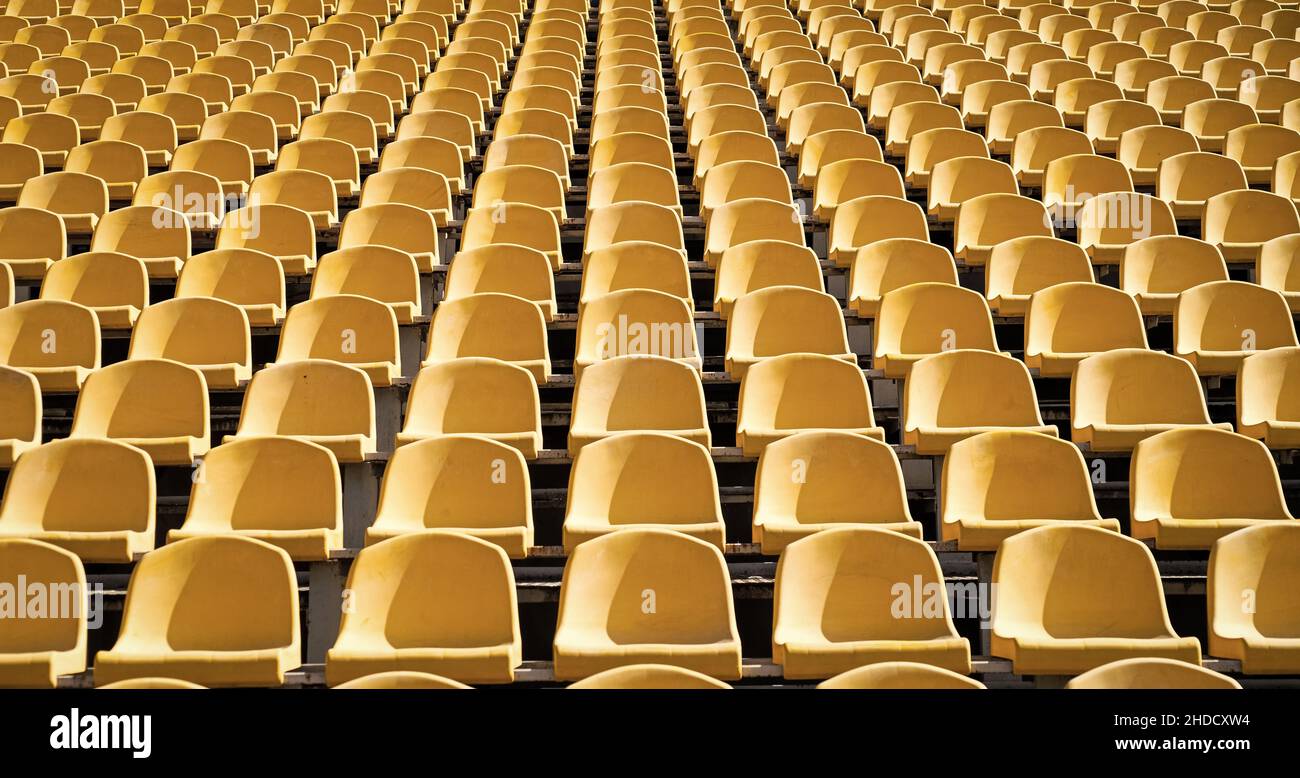 Tribune sports stadium with empty chairs Stock Photo - Alamy