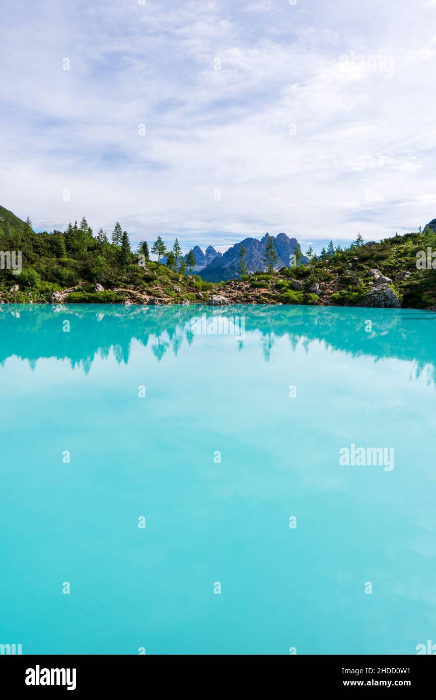 Lake Sorapis Italian Dolomites, Morning with clear sky on Lago di Sorapis in Italian Dolomites, lake with unique turquoise color water in Belluno prov Stock Photo