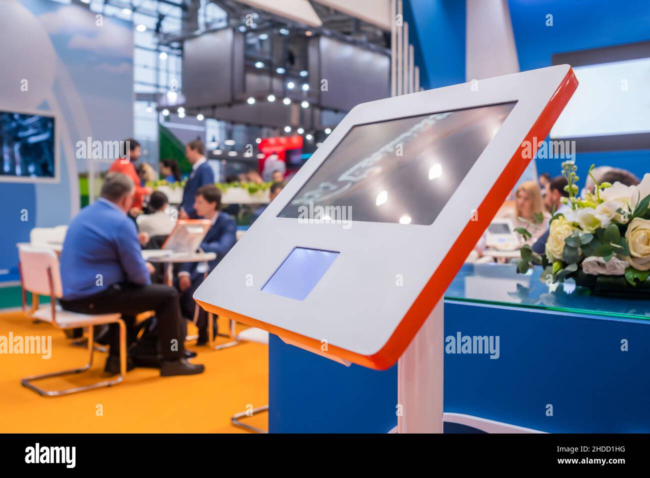 Electronic kiosk with touchscreen display at business exhibition