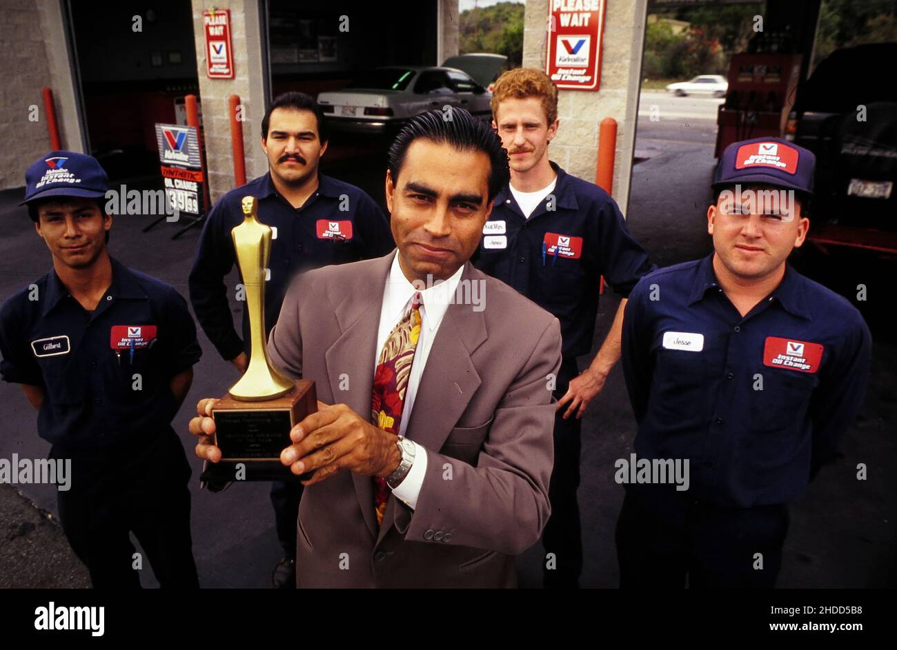 San Antonio Texas USA, 1994 Valvoline franchise owner, surrounded by