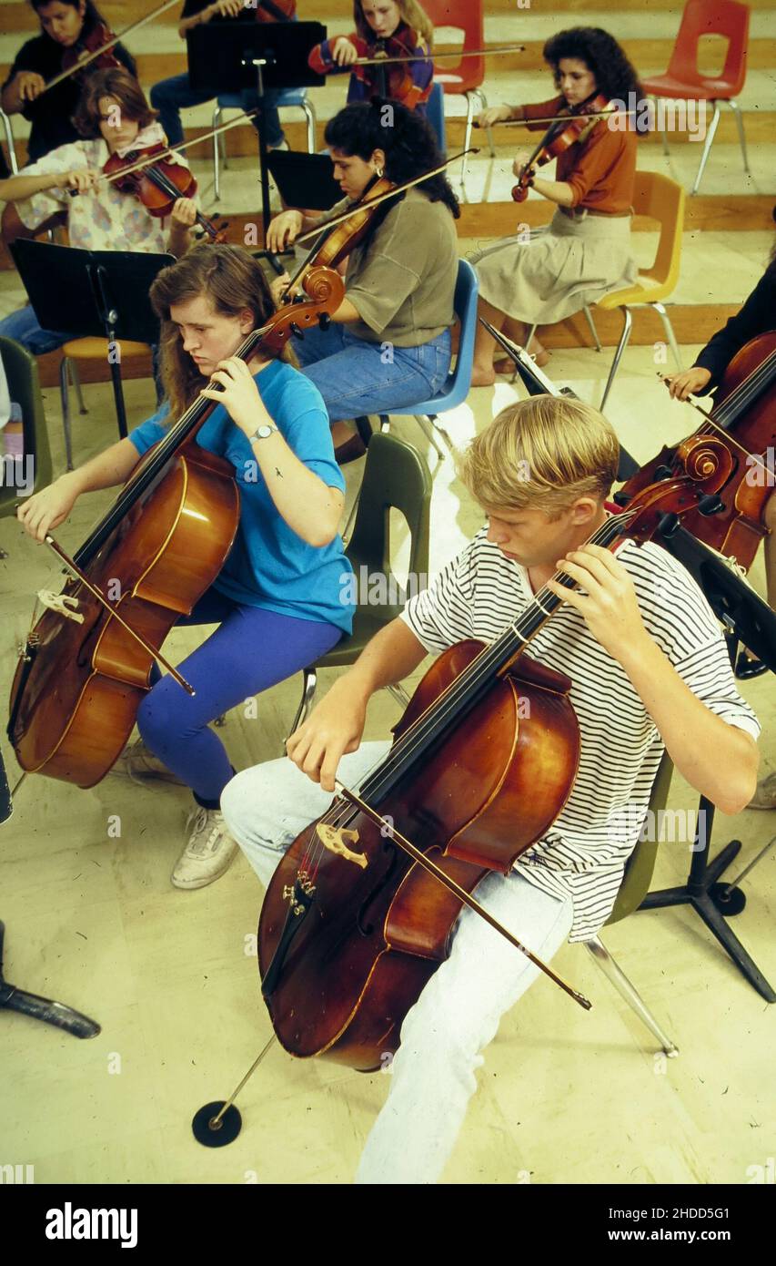 Austin Texas USA, 1992 High school orchestra members practice in the
