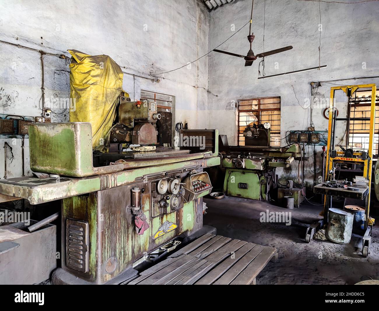 Kolhapur, Maharashtra,India- November 26th 2021; Stock photo of industrial factory interior with grinding surface machine ,other equipments and object Stock Photo