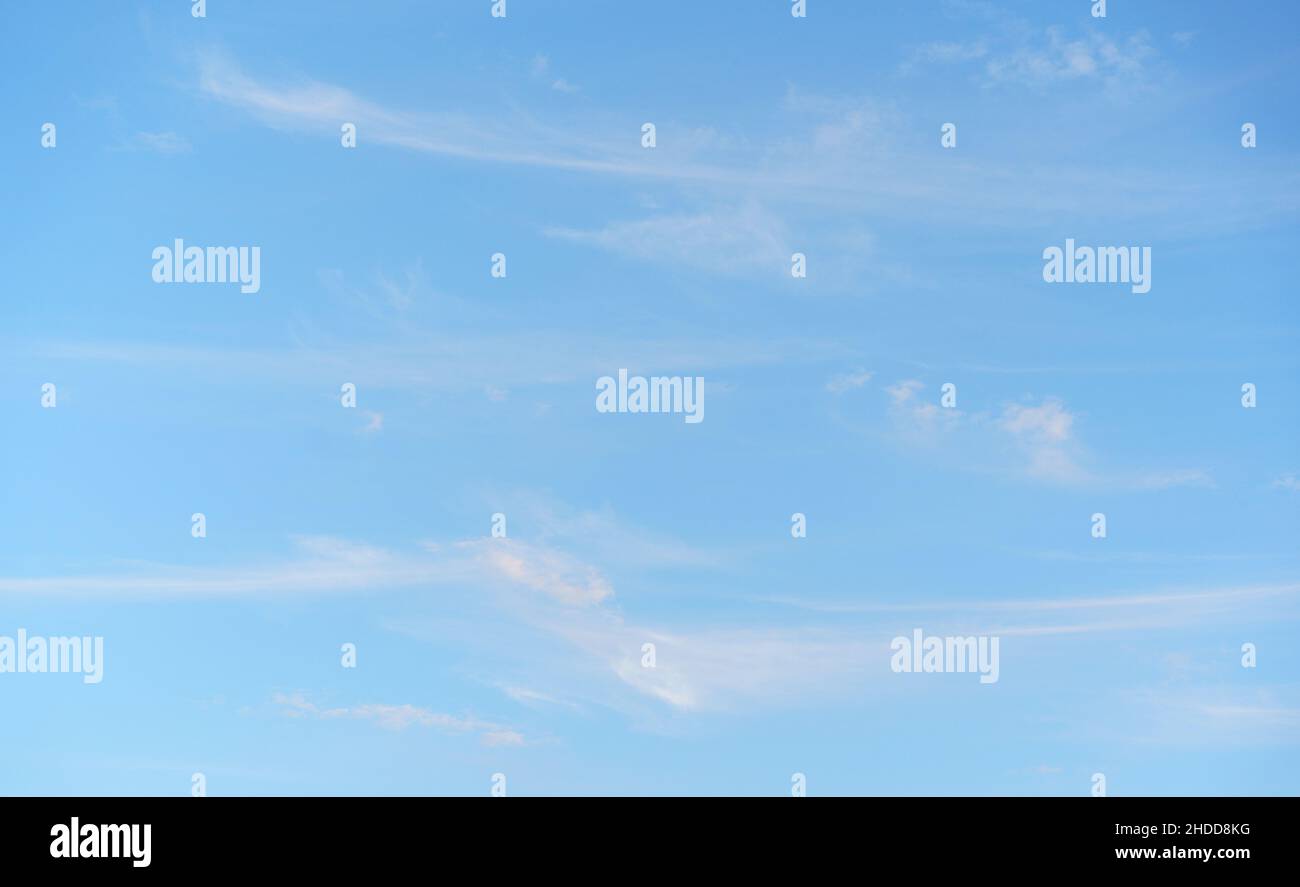 Blue sky with white cloud. Beauty clear cloudy in sunshine calm bright winter air background. Stock Photo