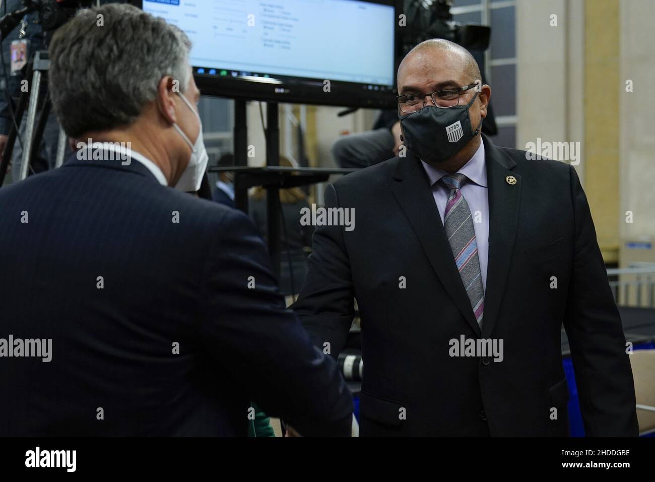 Washington, United States. 05th Jan, 2022. FBI director Christopher Wray, left, greets Ronald Davis, Director of U.S. Marshals Service, as they arrive before Attorney General Merrick Garland speaks at the Department of Justice in Washington, January 5, 2022, in advance of the one year anniversary of the attack on the U.S. Capitol. Pool Photo by Carolyn Kaster/UPI Credit: UPI/Alamy Live News Stock Photo