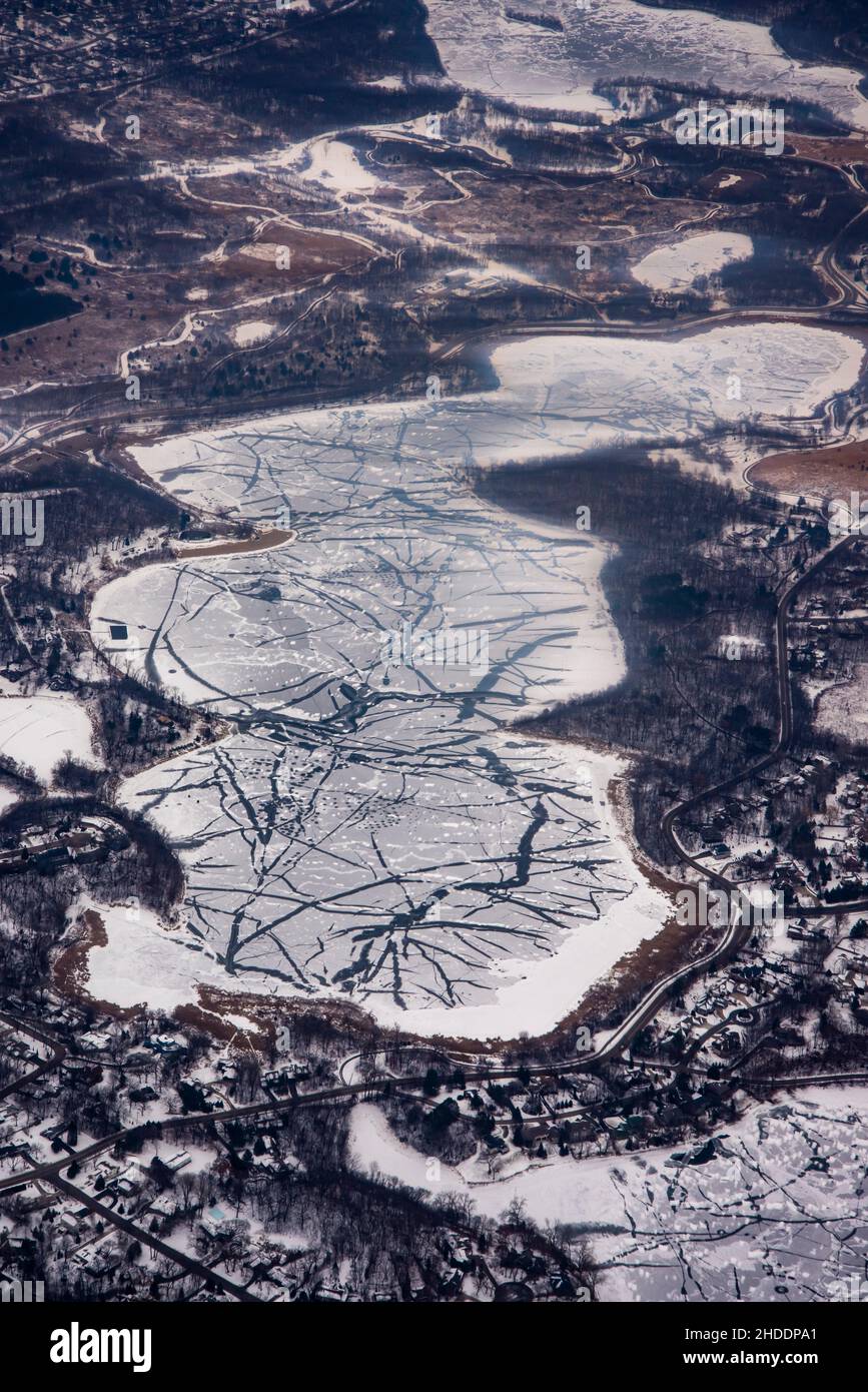 Bloomington, Minnesota. Aerial view of cracked ice formations on pond in the winter Stock Photo