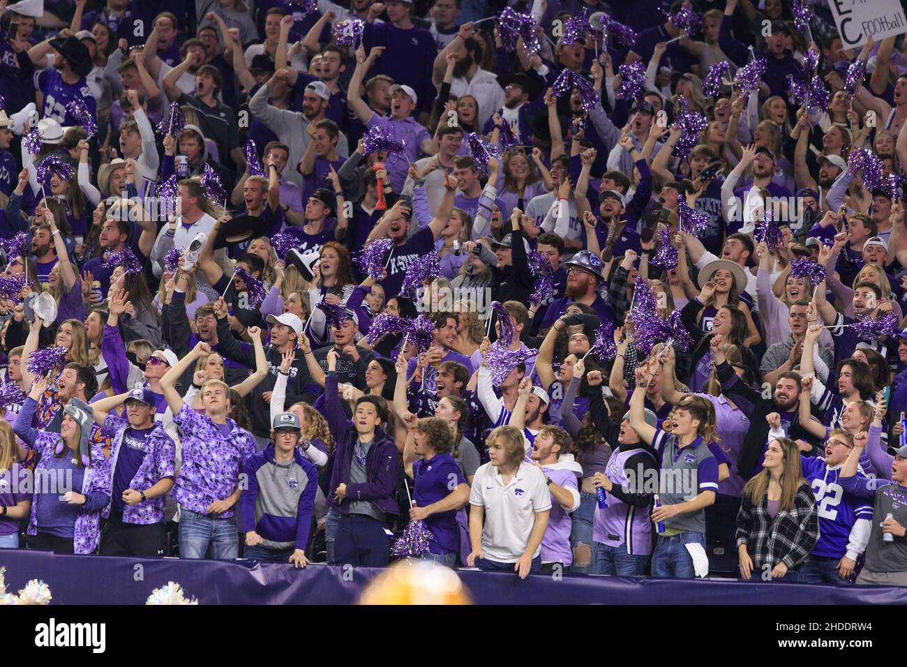 The Kansas State Wildcats student section cheers on the team against the LSU Tigers during the TaxAct Texas Bowl, Tuesday, Jan. 4, 2022, in Houston, T Stock Photo