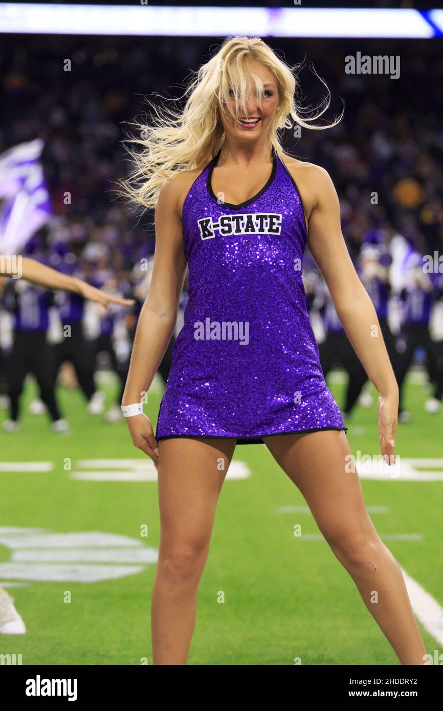 A member of the Kansas State Classy Cats performs at halftime during the TaxAct Texas Bowl, Tuesday, Jan. 4, 2022, in Houston, Texas. Kansas State Wil Stock Photo
