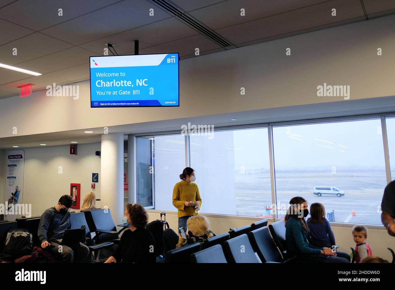 Information monitor at Gate B11 in Charlotte Douglass International Airport welcoming passengers to Charlotte, North Carolina, USA. Stock Photo