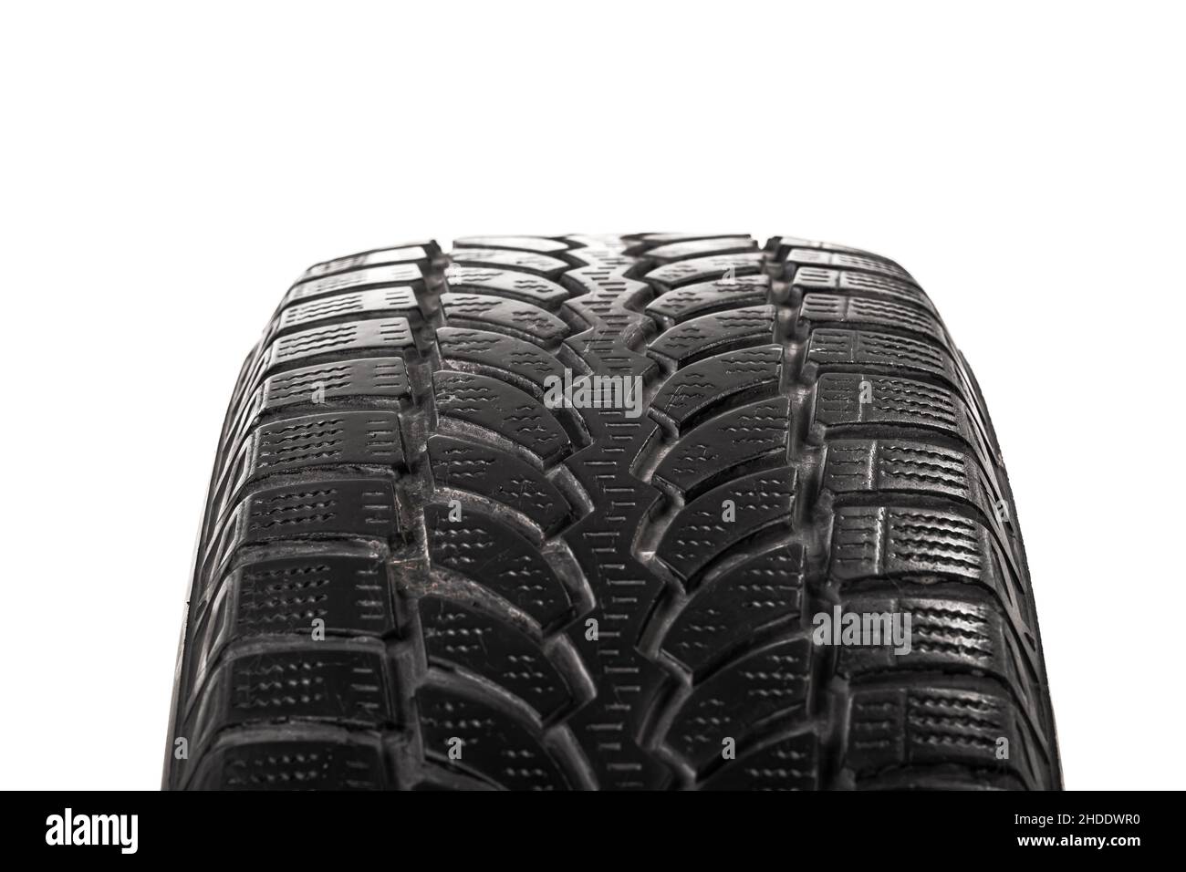 Car winter tire isolated on white background. Winter tyre cover. Rubber