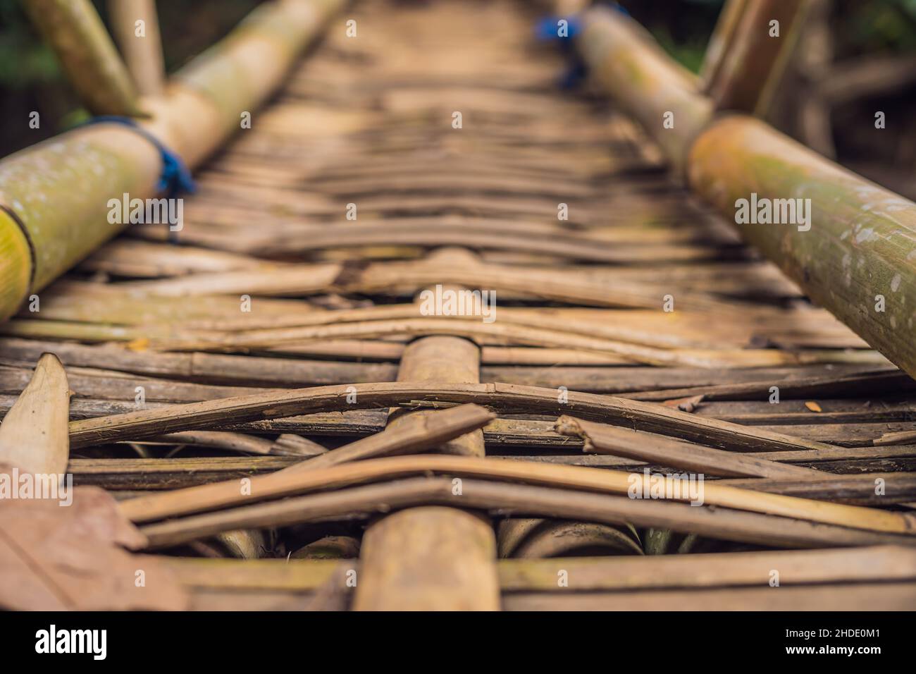 Ancient wooden suspension bridge in Bali, Indonesia Stock Photo