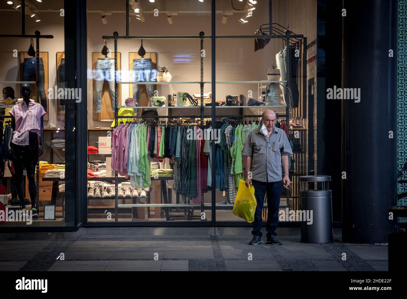 FILE--Passengers Smoke Cigarettes In A Smoking Area At The Terminal 3 Of The Beijing Capital International Airport In Beijing, China, 1 June 2015 Stock Photo