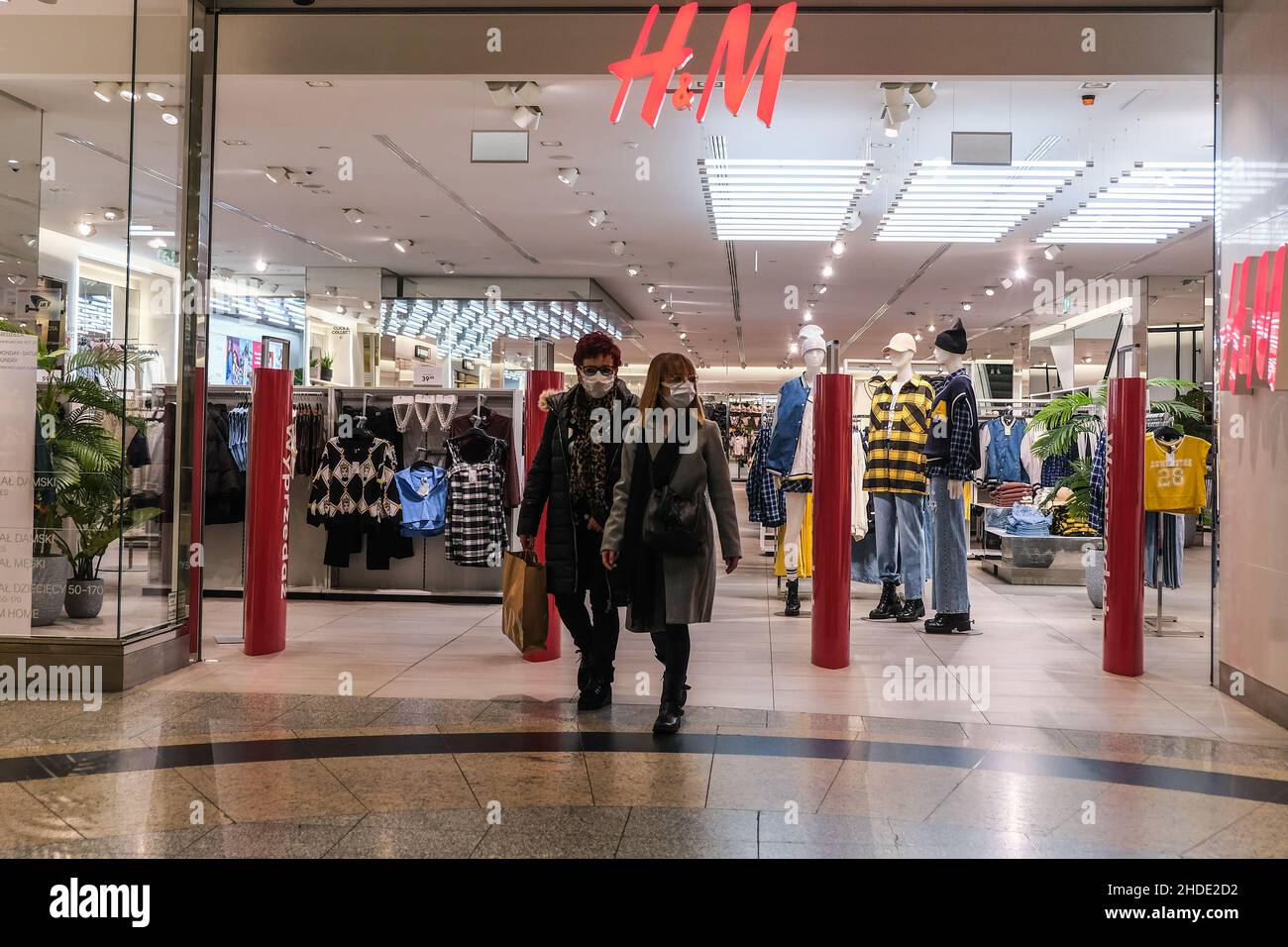 People exit a H M store inside a shopping mall. Photo by Omar Marques SOPA Images Sipa USA Stock Photo Alamy