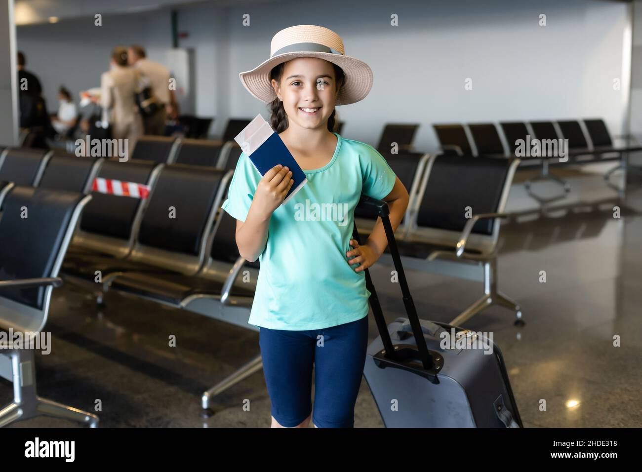 little girl with suitcase travel in the airport, kids travel Stock