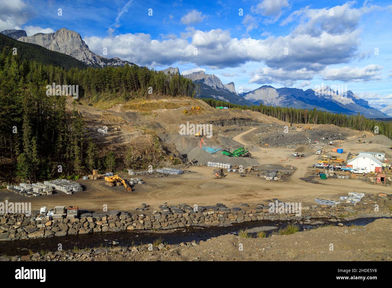 Rock quarry producing Rundle Rock a beautiful, flat and easy to use natural stone that originates in the great Canadian Rocky Mountains. Rich in chara Stock Photo
