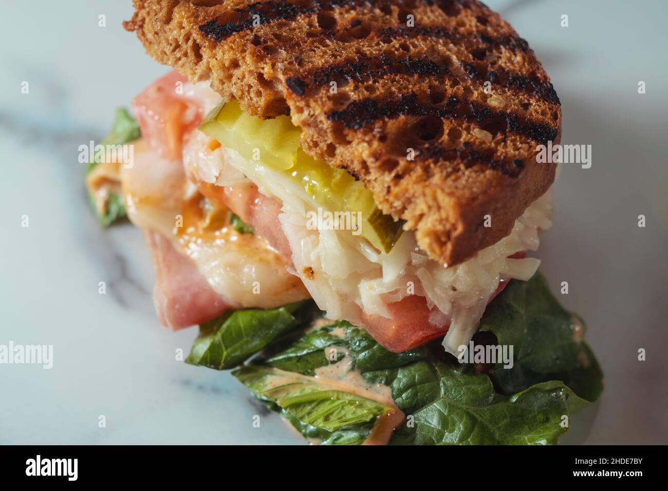 Toasted reuben ham sandwich with cole slaw and thousand island dressing