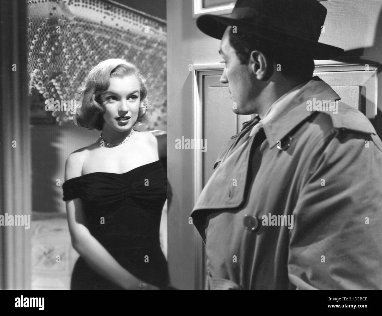 Marilyn Monroe and Sterling Hayden in The Asphalt Jungle (1950), directed by John Huston - film still Stock Photo