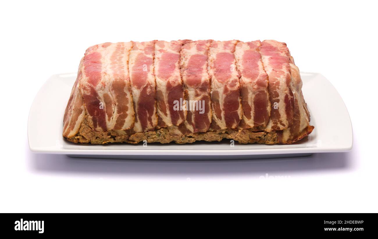 Traditional French terrine covered with bacon isolated on white