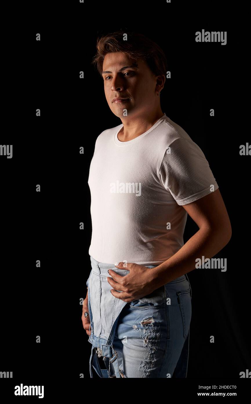 portrait latin man in studio black background Stock Photo