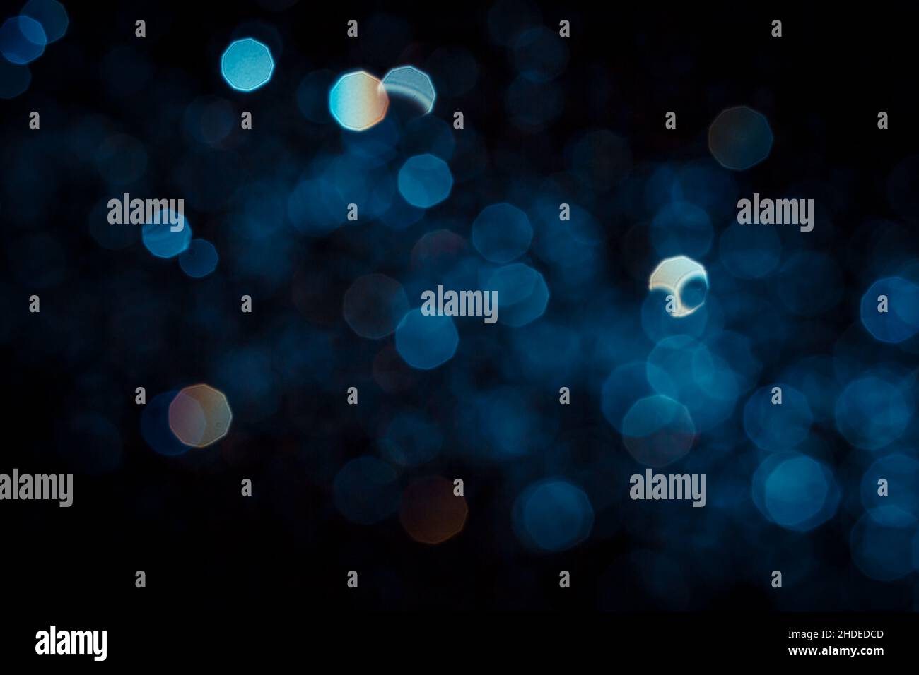 Abstract blue bokeh texture on black background Stock Photo - Alamy