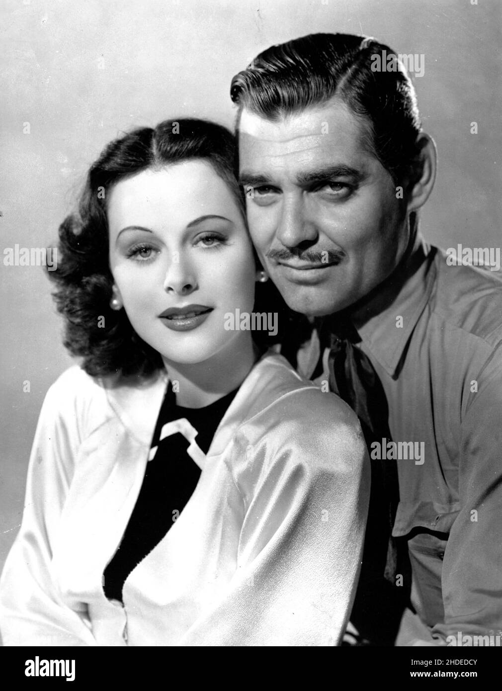 CLARK GABLE and HEDY LAMARR in BOOM TOWN (1940), directed by JACK CONWAY. Credit: M.G.M. / Album Stock Photo