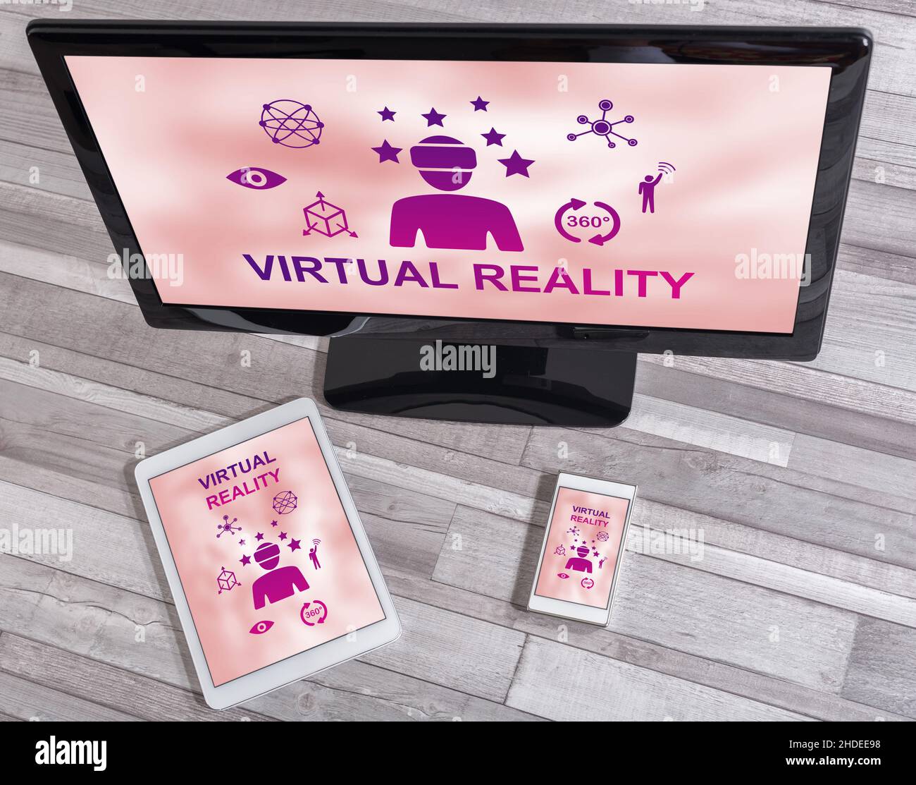 Virtual reality concept shown on different information technology devices Stock Photo