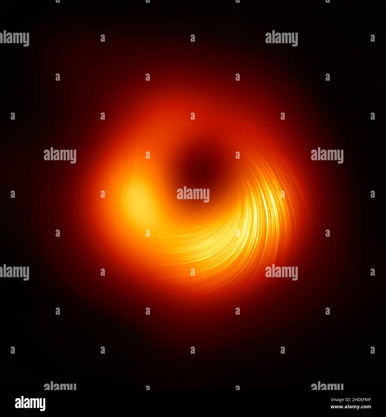 (220106) -- BEIJING, Jan. 6, 2022 (Xinhua) -- Photo released on March 24, 2021 on 'Astrophysical Journal Letters' shows a polarized view of the black hole. (CAS Shanghai Astronomical Observatory via Xinhua) Stock Photo
