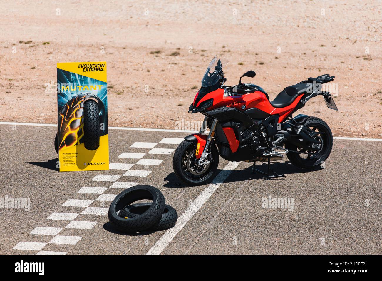 Almería, Spain - May 4th 2021: A red BMW motorbike and Dunlop Mutant Tyres  advertisement totem on the circuit finish line, during Dunlop Xperience sho  Stock Photo - Alamy