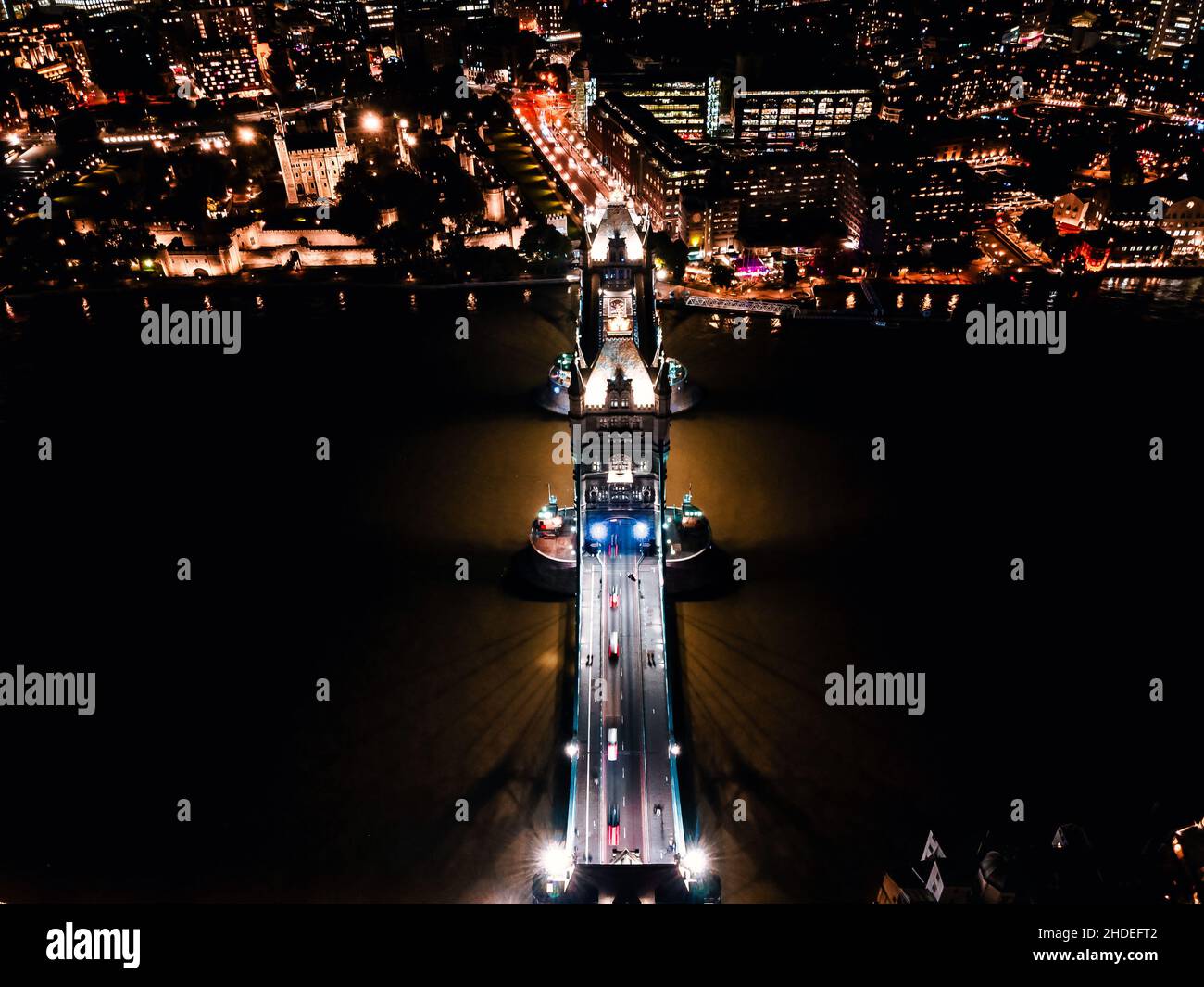 Aerial drone view of London Tower Bridge at night City center and the River Thames, England, United Kingdom Stock Photo