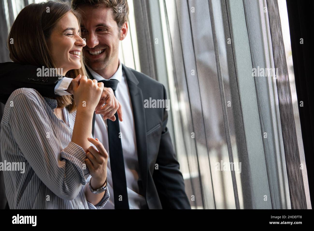 Young loving happy couple have fun smiling and talking Stock Photo
