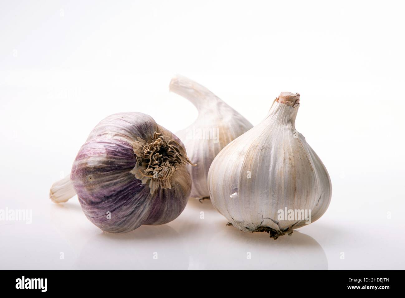Garlic isolated on white background close up. Raw garlic with clove. Garlic bulb Stock Photo