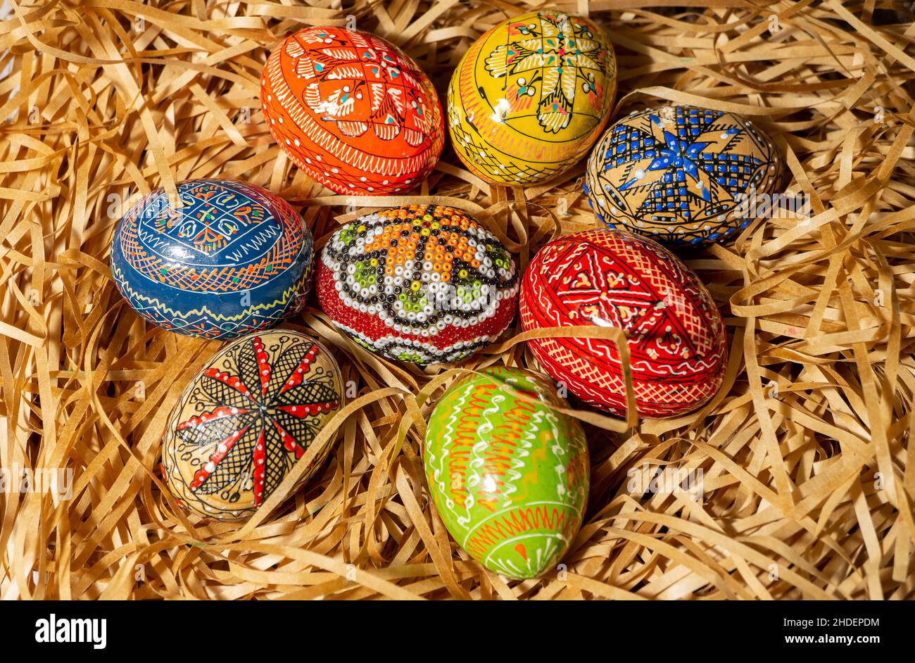 Closeup of colorful hand-painted eggs represenint 7 styles from different regions of Romania Stock Photo