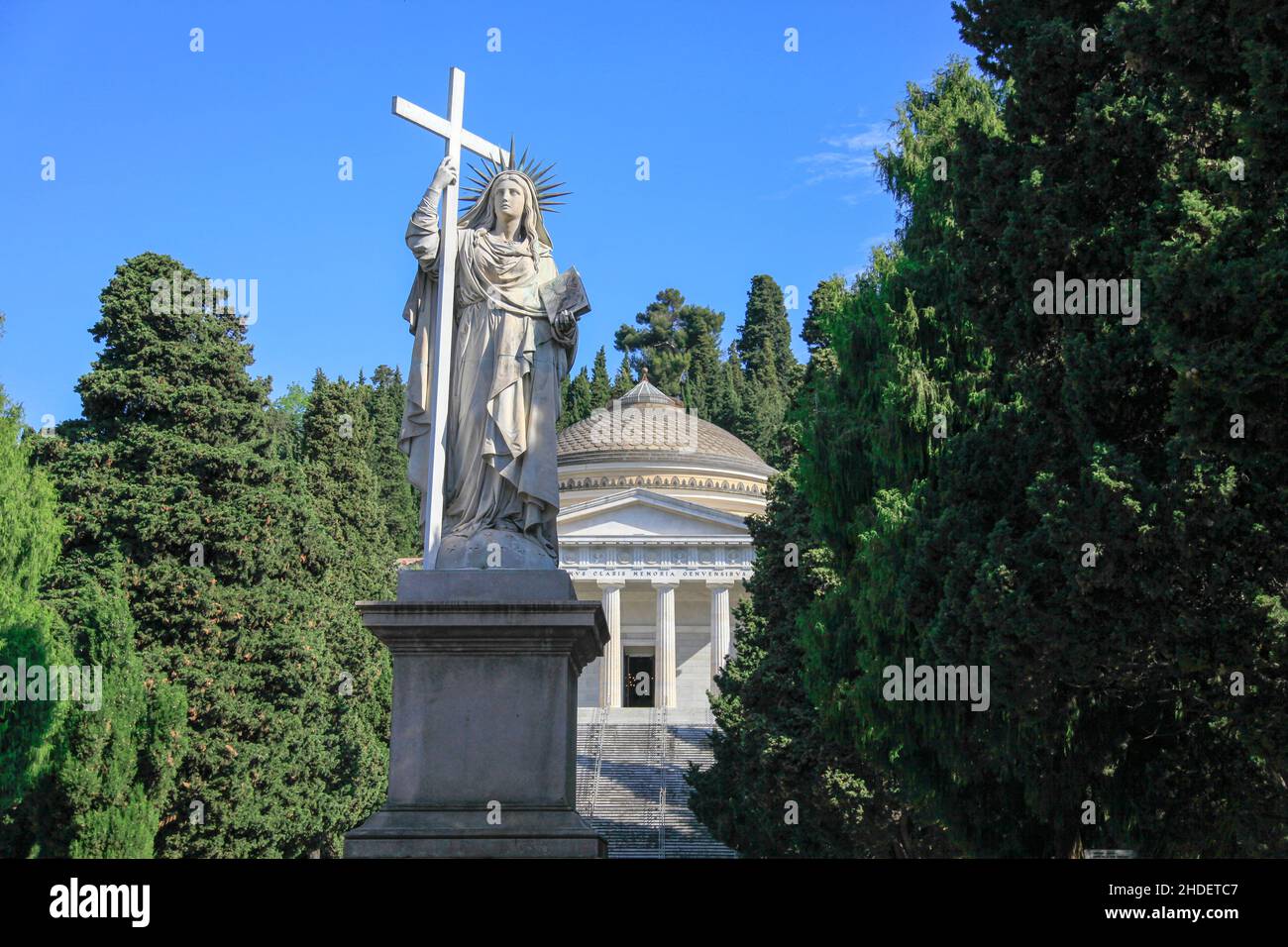 The 9m high statue of Faith with the Pantheon behind at the Monumental Cemetery of Staglieno (Cimitero monumentale di Staglieno), Genoa, Italy Stock Photo