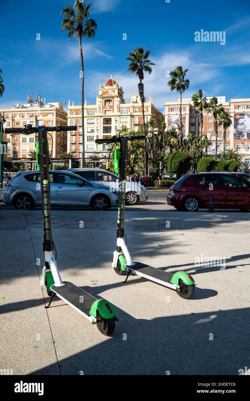 Electric scooter parked on a sidewalk in Malaga. Andalucia. Spain Stock Photo
