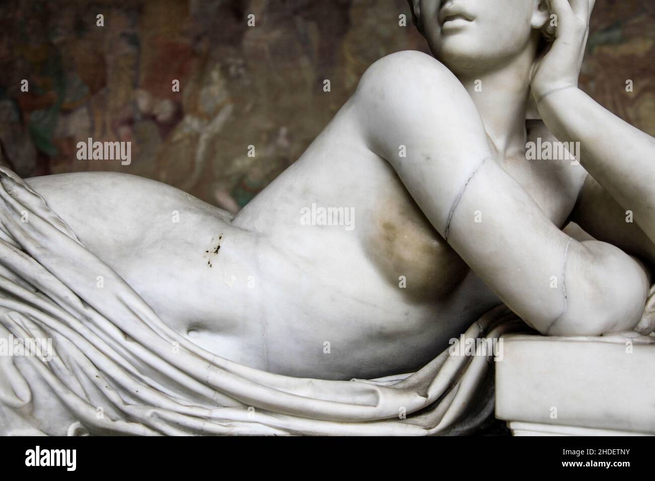 Erotica - Marble statue of a semi nude reclining woman Stock Photo
