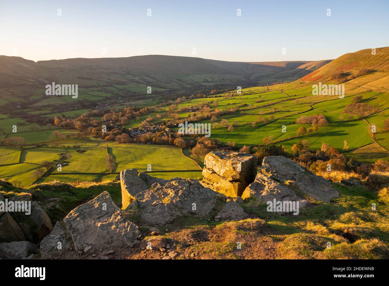 View of the Vale of Edale, Derbyshire from path below Ringing Roger on the edge of Kinder Scout in the Peak District. A sunny November morning. Stock Photo
