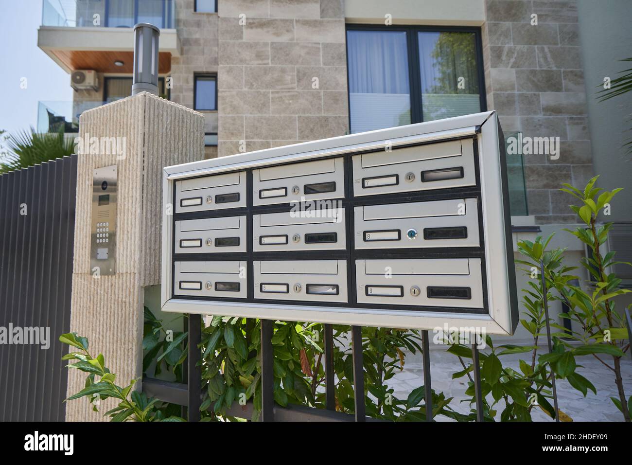 Mailboxes for a modern residential apartments building. Stock Photo