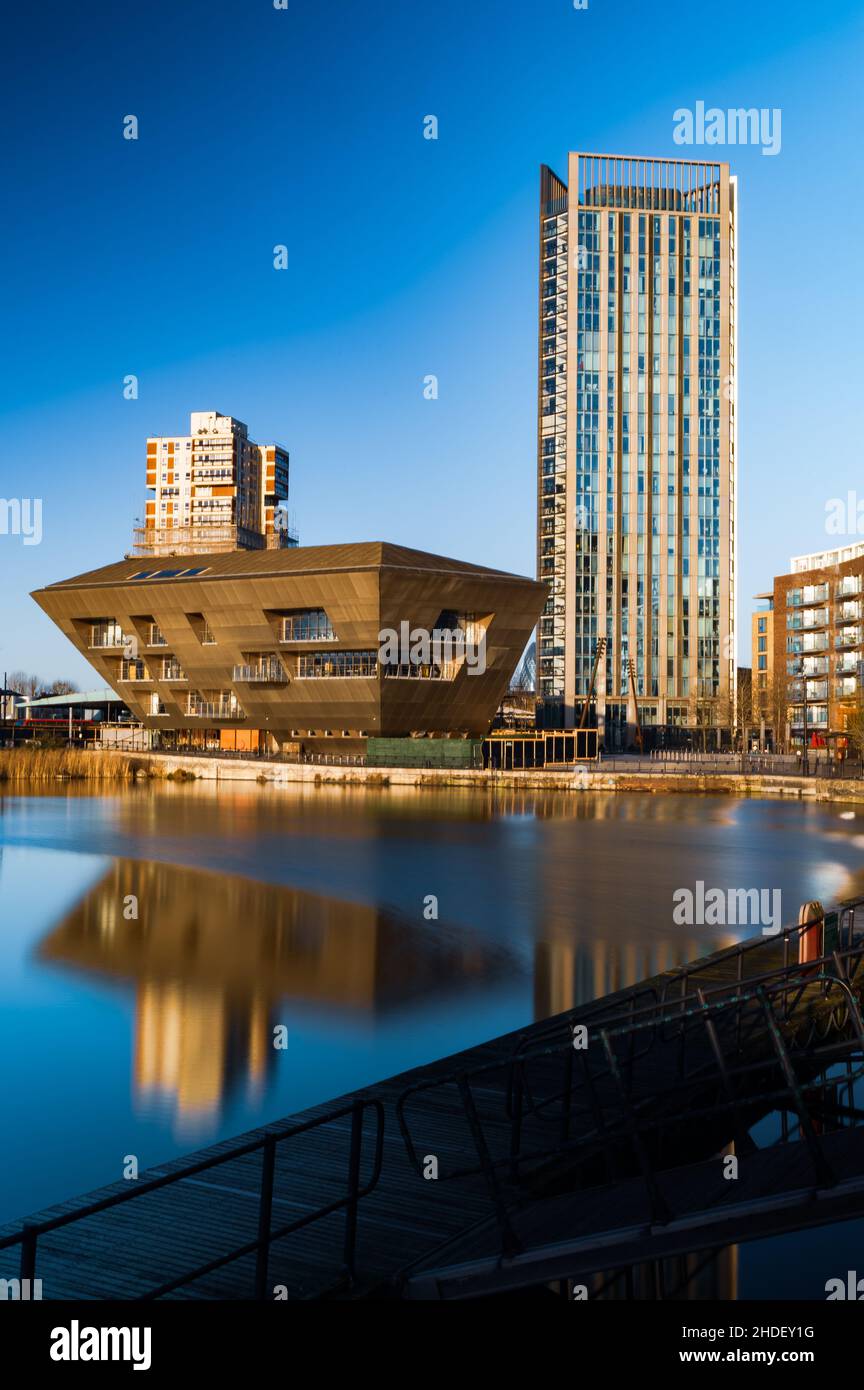 Canada Water Library, South London reflected in the lake at Surrey Quays by CZWG architects Stock Photo
