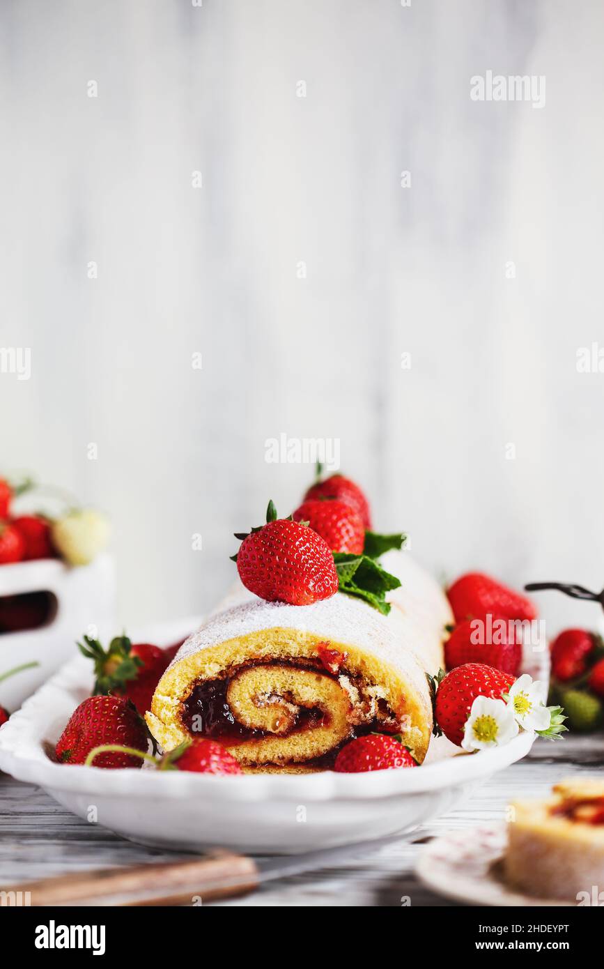 Homemade strawberry shortcake cake roll, Sponge or Roulade with a berry ...